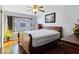 Inviting bedroom with hardwood floors and ample natural light at 5092 Mandalay Springs Dr # 201, Las Vegas, NV 89120