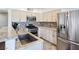 Modern kitchen with stainless steel appliances and granite countertops at 5092 Mandalay Springs Dr # 201, Las Vegas, NV 89120