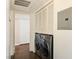 Convenient laundry room featuring modern washer and dryer with storage cabinets above at 5092 Mandalay Springs Dr # 201, Las Vegas, NV 89120