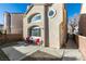 Backyard patio with a table and chairs, landscaping and view of the house at 5476 Green Horn St, Las Vegas, NV 89118