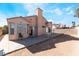 Backyard featuring a dirt area, concrete patio and covered area with ample room for outdoor entertaining and leisure at 6224 Mandarin Dr, Las Vegas, NV 89108
