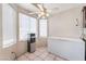 An open dining area featuring a ceiling fan, beverage cooler and deep freezer at 6224 Mandarin Dr, Las Vegas, NV 89108