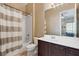 Classic bathroom featuring a shower and tub combination, vanity, and tile flooring at 6308 Lauren Ashton Ave, Las Vegas, NV 89131