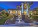 Inviting front entrance with decorative landscaping and a set of concrete steps at 6308 Lauren Ashton Ave, Las Vegas, NV 89131