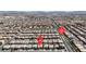 This is an aerial view showing a neighborhood with easy access to S. Torrey Pines Dr., surrounded by well-maintained landscaping at 6461 Mount Eden Ave, Las Vegas, NV 89139