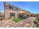 Enjoy the outdoors in this backyard with a covered patio and faux grass at 6461 Mount Eden Ave, Las Vegas, NV 89139