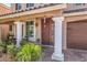 Inviting entrance with decorative metal security door, and attractive brick pavers at 6461 Mount Eden Ave, Las Vegas, NV 89139