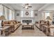 Bright living room features hardwood floors, a fireplace, and neutral decor at 6461 Mount Eden Ave, Las Vegas, NV 89139