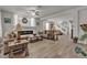 Bright living room with hardwood floors, fireplace, and neutral decor at 6461 Mount Eden Ave, Las Vegas, NV 89139