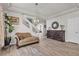 Spacious living room features hardwood floors, neutral decor, and lots of natural light at 6461 Mount Eden Ave, Las Vegas, NV 89139