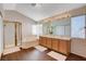 Bright bathroom with a walk-in shower, corner tub, and dual sink vanity at 7624 Nocturne Ct, Las Vegas, NV 89128