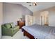 Spacious bedroom offering a calming retreat with high ceilings and access to an en-suite bathroom at 7624 Nocturne Ct, Las Vegas, NV 89128