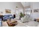 Spacious living room with vaulted ceiling and stylish decor at 7624 Nocturne Ct, Las Vegas, NV 89128