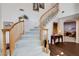 Sweeping staircase that adds architectural interest at 7624 Nocturne Ct, Las Vegas, NV 89128
