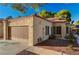 Charming single-story home with a two-car garage, desert landscaping, and a red tile roof at 7900 Shelter Island Way, Las Vegas, NV 89145