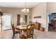 Inviting dining area with neutral tones and decorative wall plates at 8233 Valley Stream Ave, Las Vegas, NV 89131