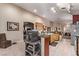 Bright, open kitchen with stainless steel appliances and bar seating at 8233 Valley Stream Ave, Las Vegas, NV 89131