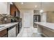 Modern kitchen featuring stainless steel appliances, a center island, and ample counter space at 9772 Toad Hollow St, Las Vegas, NV 89141