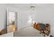 Bright bedroom featuring a ceiling fan, closet and an adjacent room at 10808 Aire Dr, Las Vegas, NV 89144