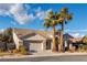 Inviting single-story home featuring desert landscaping and a two-car garage at 10808 Aire Dr, Las Vegas, NV 89144