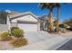 Lovely single-story home featuring desert landscaping and a two-car garage at 10808 Aire Dr, Las Vegas, NV 89144