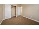 Neutral bedroom with closet, base trim, and carpeted floors with hall access at 1219 Diamond Valley St, Henderson, NV 89052