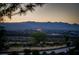 Scenic view of the city skyline and surrounding mountains at sunset at 1219 Diamond Valley St, Henderson, NV 89052