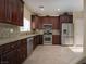 Modern kitchen boasts stainless steel appliances and granite countertops at 1219 Diamond Valley St, Henderson, NV 89052