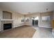 Inviting living room with a fireplace, and sliding doors leading to the outdoor space at 1219 Diamond Valley St, Henderson, NV 89052