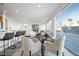 Dining area with backyard view, open to kitchen and living room at 1722 Game Garden Rd, North Las Vegas, NV 89031