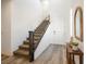 Hallway with a staircase and stylish wood-like flooring at 1722 Game Garden Rd, North Las Vegas, NV 89031