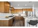 Bright kitchen with an island, stainless steel appliances, and ample counter space at 1722 Game Garden Rd, North Las Vegas, NV 89031