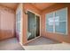 Private outdoor balcony area with secure access door and serene neighborhood views at 20 E Serene Ave # 304, Las Vegas, NV 89123