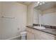 Bathroom with granite countertop vanity and a shower-tub combo at 20 E Serene Ave # 304, Las Vegas, NV 89123