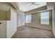 Bright bedroom features a ceiling fan, wood flooring and natural light at 20 E Serene Ave # 304, Las Vegas, NV 89123