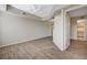 Large bedroom featuring modern ceiling fan, wood floors and walk-in closet at 20 E Serene Ave # 304, Las Vegas, NV 89123