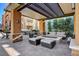 Outdoor community space featuring a covered area with seating and fire pit at 20 E Serene Ave # 304, Las Vegas, NV 89123