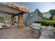 Outdoor grilling area featuring stainless steel grills and stone pillars at 20 E Serene Ave # 304, Las Vegas, NV 89123
