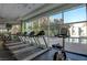 Bright condo gym features rows of modern treadmills with exterior views at 20 E Serene Ave # 304, Las Vegas, NV 89123