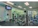 Community gym featuring weight machines and televisions for residents' enjoyment at 20 E Serene Ave # 304, Las Vegas, NV 89123
