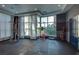 Well-equipped gym with workout equipment and natural light from large windows at 20 E Serene Ave # 304, Las Vegas, NV 89123