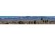 Wide angle panoramic distant mountain range view over a valley and neighborhoods at 20 E Serene Ave # 304, Las Vegas, NV 89123