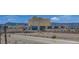 A desert neighborhood featuring casinos and townhouses under a clear blue sky with mountain views at 20 E Serene Ave # 304, Las Vegas, NV 89123