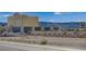 A neighborhood featuring casinos, hotels, and homes under a clear blue sky with mountain views at 20 E Serene Ave # 304, Las Vegas, NV 89123