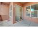 Spacious balcony featuring stucco walls, sliding glass doors, and a window at 20 Serene Ave # 201, Las Vegas, NV 89123
