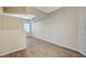 Bright living room featuring wood flooring, neutral paint, and a ceiling fan at 20 Serene Ave # 201, Las Vegas, NV 89123
