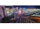 Enjoy city views from this condo balcony featuring a seating area and a clear view of the Las Vegas Strip at 205 E Harmon Ave # 704, Las Vegas, NV 89169