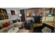Relaxing living room with ample seating, wood floors, and a bright, open layout at 205 E Harmon Ave # 704, Las Vegas, NV 89169