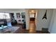 Living Room with hardwood floors, modern decor, and access to the kitchen at 205 E Harmon Ave # 704, Las Vegas, NV 89169