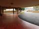Exterior shot of a building lobby entrance, with a red brick tiled walkway at 205 E Harmon Ave # 704, Las Vegas, NV 89169